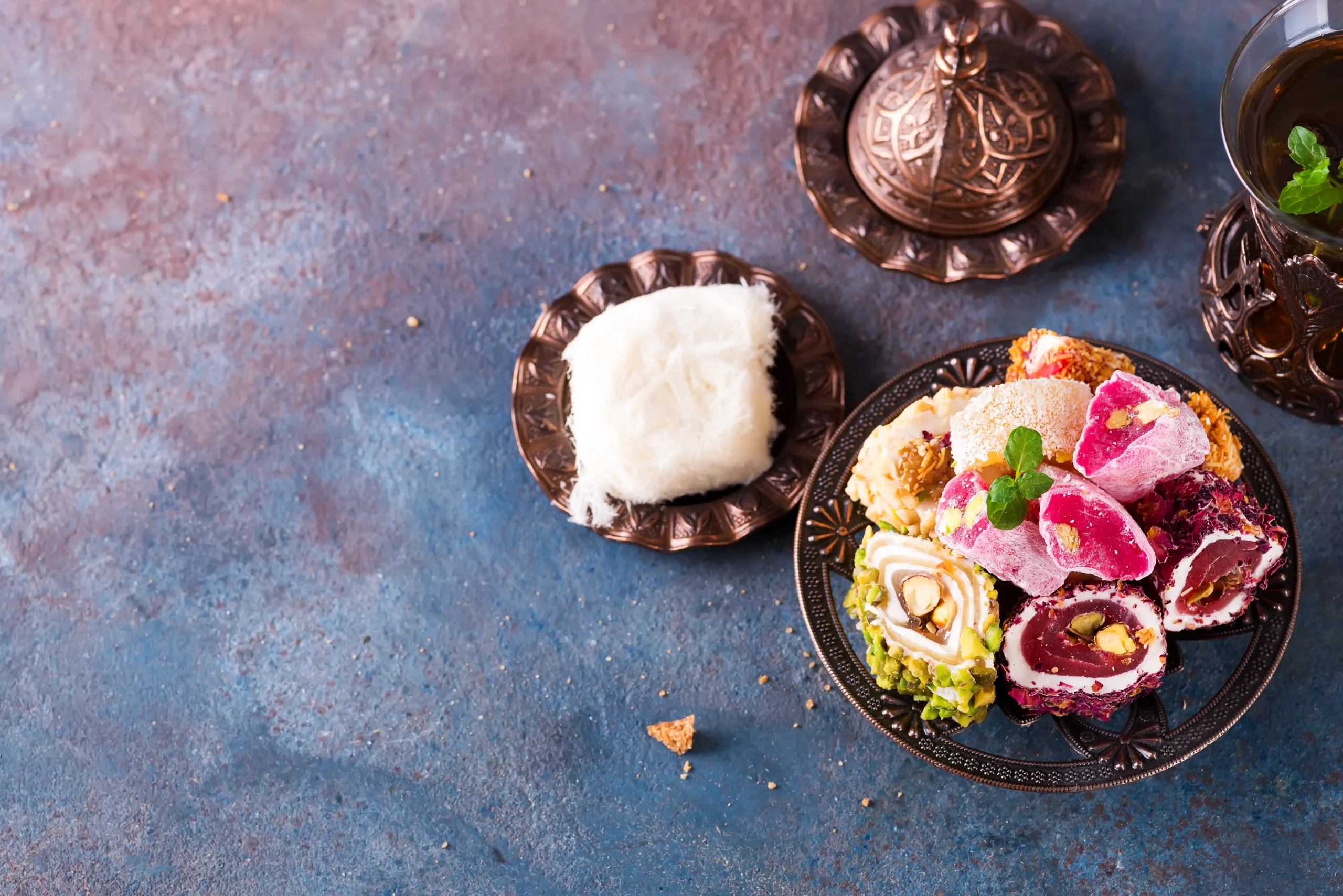 An elegant overhead presentation of colorful sweets for catering guests